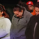 Family members at First Baptist Church in Sutherland Springs, Texas, fight back tears Wednesday as Vice President Mike Pence speaks at Floresville High School, paying respects to the victims of Sunday’s church shooting. (Kin Man Hui/San Antonio Express-News)